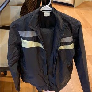 Women’s fully lined Nike warmup suit.